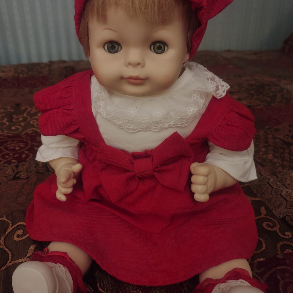 Adorable Red Doll with Bow